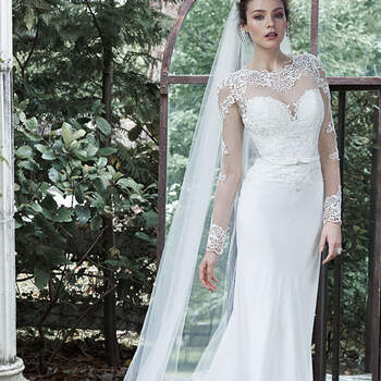This demure sheath dress gets an extra dose of drama with full-length illusion sleeves, neckline and illusion open back, edged with striking lace appliqués. Romantic lace adorns the bodice before meeting a flowing Arlo chiffon skirt. Finished with delicate belt and covered buttons over zipper closure. Available with full-length tulle and lace veil.

<a href="http://www.maggiesottero.com/dress.aspx?style=5MT663" target="_blank">Maggie Sottero</a>
