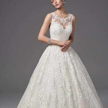 This show-stopping ballgown features layers of lace appliqués and tulle accented with a shimmer of sequins. Lace appliqués trim the illusion jewel over sweetheart neckline, illusion straps, and illusion open back. Complete with sheer pockets below the natural waist and a breathtaking train. Finished with covered buttons and zipper closure. 
<a href="https://www.maggiesottero.com/sottero-and-midgley/orianna/10247?utm_source=mywedding.com&amp;utm_campaign=spring17&amp;utm_medium=gallery" target="_blank">Sottero and Midgley</a>
