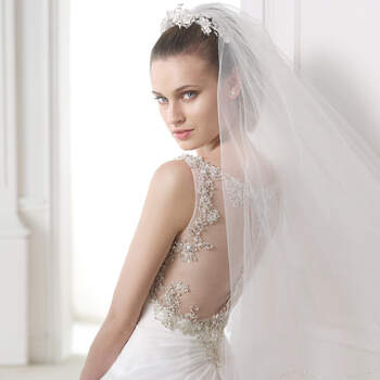 <a href="http://zankyou.9nl.de/zyii">Click here for an appointment at Pronovias and view their new 2015 collection.</a> 