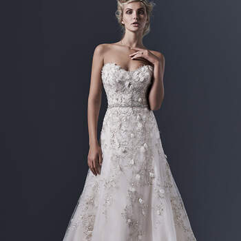 Tüll kreiert dieses elegante Brautkleid in A-Linie. Besondere Swarovski-Kristalle und feminine 3D-Blumen machen das Hochzeitskleid zum Traumkleid schlechthin. 


<a href="http://www.sotteroandmidgley.com/dress.aspx?style=5SR606" target="_blank">Sottero &amp; Midgley</a>