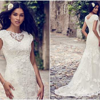 Beaded lace motifs cascade over tulle in this classic fit-and-flare wedding dress, accenting the illusion bateau neckline and illusion-trimmed cap-sleeves. Lined with shapewear for a figure-flattering fit. Finished with covered buttons over zipper closure. 

<a href="https://www.maggiesottero.com/maggie-sottero/stacey/11193?utm_source=zankyou&amp;utm_medium=gowngallery" target="_blank">Maggie Sottero</a>