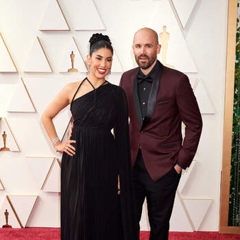 Stephanie Beatriz and guest arrive on the red carpet of the 94th Oscars® at the Dolby Theatre at Ovation Hollywood in Los Angeles, CA, on Sunday, March 27, 2022.