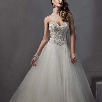 Decadent Swarovski crystals and pearls adorn the bodice of this romantic ballgown, complete with voluminous tulle skirt and dramatic sweetheart neckline. Finished with crystal button over zipper and inner corset closure.
<img height='0' width='0' alt='' src='http://ads.zankyou.com/mn8v' />