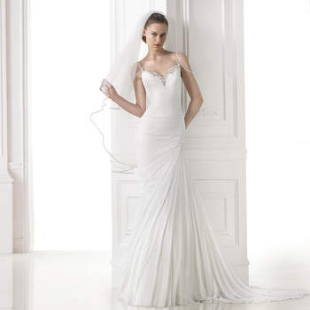 <a href="http://zankyou.9nl.de/zyii">Click here for an appointment at Pronovias and view their new 2015 collection.</a> 