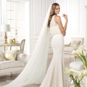 <a href="http://zankyou.9nl.de/zyii">Click here for an appointment at Pronovias and view their new 2015 collection.</a> 