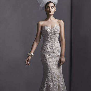 Pizzo e cristalli si combinano in questo splendido abito Exquisite lace and dazzling Swarovski crystals combine to create this  strapless fit and flare wedding dress. Complete with crystal embellishment along a sweetheart neckline. Finished with corset closure. Also available in crystal button over zipper and inner corset closure.

<a href="http://www.sotteroandmidgley.com/dress.aspx?style=5SS114LU" target="_blank">Sottero and Midgley Spring 2015</a>