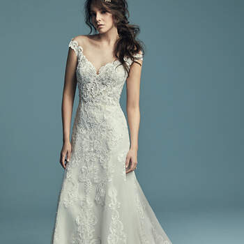 <a href="https://www.maggiesottero.com/maggie-sottero/serena/11431">Maggie Sottero</a>

Embroidered lace motifs cascade over tulle in this romantic illusion off-the-shoulder slim A-line wedding dress, completing the portrait neckline, sheer bodice, and illusion keyhole back. Finished with covered buttons over zipper closure. 
