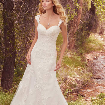 A lovely crosshatch-patterned tulle features cascades of lace appliqués in this timeless fit-and-flare, complete with strapless sweetheart neckline and scalloped lace hem. Finished with corset closure, or covered buttons over zipper and inner elastic closure. Detachable cap-sleeves with lace appliqués sold separately. 
<a href="https://www.maggiesottero.com/maggie-sottero/samantha/10141?utm_source=mywedding.com&amp;utm_campaign=spring17&amp;utm_medium=gallery" target="_blank">Maggie Sottero</a>