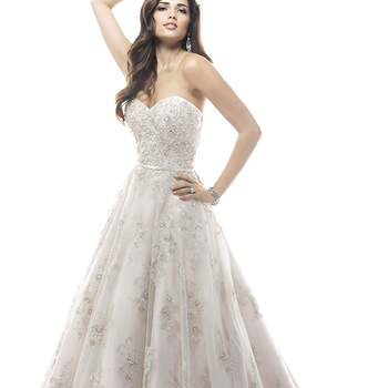 Fall in love all over again in this dreamy ballgown, delicately placed embroidered lace on tulle sparkles with metallic thread and Swarovski crystals. Complete with a delicate waistband and zipper over inner elastic closure.
<a href="http://www.maggiesottero.com/dress.aspx?style=4MS901" target="_blank">Maggie Sottero</a>