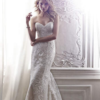 This lace A-Line gown channels timeless elegance with its classic sweetheart neckline, cascading floral lace appliqués, lace-trimmed hemline and optional lace cap-sleeves. Finished with corset closure or crystal button over zipper closure with inner corset.

<a href="http://www.maggiesottero.com/dress.aspx?style=5MS146LU" target="_blank">Maggie Sottero Spring 2015</a>