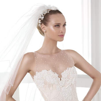 <a href="http://zankyou.9nl.de/zyii">Click here for an appointment at Pronovias and view their new 2015 collection.</a> 