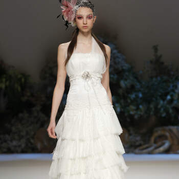 A colecção de vestidos de noiva Inmaculada García 2013 é romântica, elegante e sexy. A estilista define-a como 'neo-vintage'.