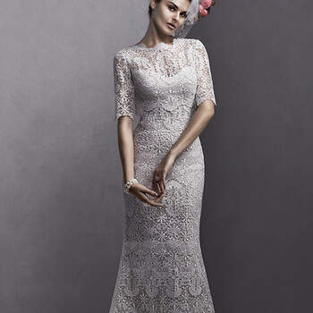 Elaborately patterned Venise lace adorns this A-Line gown, complete with a scalloped hemline and straps. Available with lace jacket with scalloped sleeves and neckline. Finished with covered button over zipper closure.

<a href="http://www.sotteroandmidgley.com/dress.aspx?style=5SS095" target="_blank">Sottero and Midgley Spring 2015</a>