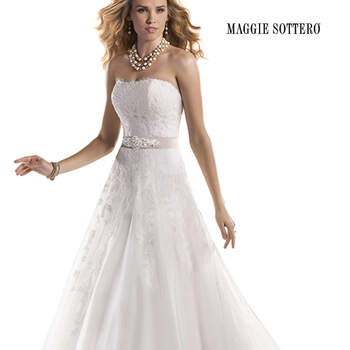 The epitome of timeless romance is found in this A-line gown, accented with Alençon lace appliqués floating delicately over a tulle skirt. Finished with strapless scoop neckline and signature corset back closure. Accented with detachable grosgrain ribbon belt or detachable grosgrain ribbon belt with beaded embellishments.

<a href="http://www.maggiesottero.com/dress.aspx?style=3ME766" target="_blank">Maggie Sottero Platinum 2015</a>