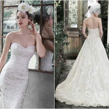 <a href="https://www.maggiesottero.com/maggie-sottero/dallasandra/9278" target="_blank">Maggie Sottero</a>

Elegance and romance combine to create this dreamy ball gown. Exquisite lace, accented with pearl embellishments, adorns a fitted bodice before flaring into a voluminous tulle skirt, edged in delicate lace. Complete with sweetheart neckline, optional lace cap-sleeves and corset closure.