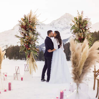 Wedding ceremony in winter time with couple and bride in the snow, Engadin St. Moritz