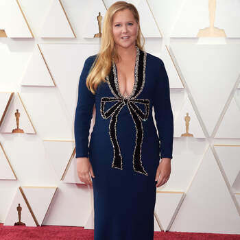 Co-host Amy Schumer arrives on the red carpet of the 94th Oscars® at the Dolby Theatre at Ovation Hollywood in Los Angeles, CA, on Sunday, March 27, 2022.