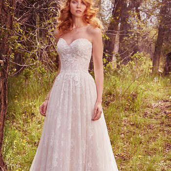 This romantic A-line features a bodice of embellished lace appliqués and an allover lace and tulle skirt. Complete with strapless sweetheart neckline and a lace hemline. Finished with covered buttons over zipper and inner corset closure. 
<a href="https://www.maggiesottero.com/maggie-sottero/rylie/10139?utm_source=mywedding.com&amp;utm_campaign=spring17&amp;utm_medium=gallery" target="_blank">Maggie Sottero</a>