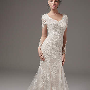 Lace appliqués dance over crosshatch-patterned tulle in this chic fit-and-flare, featuring a lace illusion train. Complete with sweetheart neckline, illusion long-sleeves, and back ruching. Finished with covered buttons over zipper closure. 
<a href="https://www.maggiesottero.com/sottero-and-midgley/melrose-lynette/10241?utm_source=mywedding.com&amp;utm_campaign=spring17&amp;utm_medium=gallery" target="_blank">Sottero and Midgley</a>
