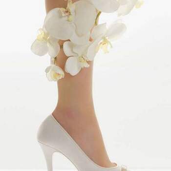 Se o vestido de noiva é importante, o sapato é igualmente especial. Além de confortável, tem que ser lindo para compor o look mais importante de todos! Veja os maravilhosos sapatos Rosa Clará 2012.

<a href="http://zankyou.9nl.de/ijc8" target="_blank">Descubra a nova colecção 2015 de Rosa Clará</a>