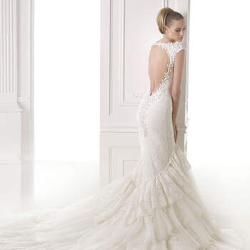 <a href="http://zankyou.9nl.de/zyii">Click here for an appointment at Pronovias and view their new 2015 collection.</a> 