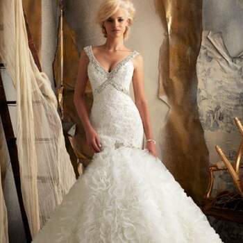 O vestido de noiva ideal deve combinar com o estilo e personalidade da noiva. E se você gosta de vestidos encorpados, estilo sereia, veja estes modelos da coleção 2013 de Mori Lee.
