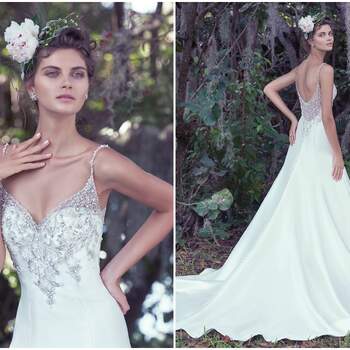 Refined elegance is found in this embellished Elodie mikado A-Line wedding dress with a deep V-neckline. Glimmering Swarovski crystals generously adorn the fitted bodice, beaded spaghetti straps, and dramatic illusion back. Finished with crystal buttons over zipper closure.

<a href="https://www.maggiesottero.com/maggie-sottero/kimberly/9686" target="_blank">Maggie Sottero</a>