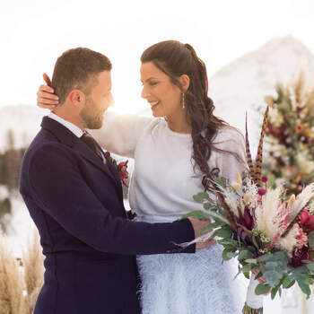 Wedding ceremony in winter time with couple and bride in the snow, Engadin St. Moritz