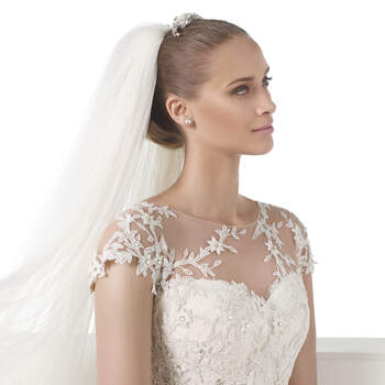 <a href="http://zankyou.9nl.de/zyii">Click here for an appointment at Pronovias and view their new 2015 collection.</a> 