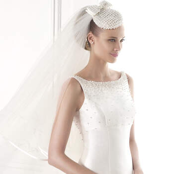 <a href="http://zankyou.9nl.de/zyii">Click here for an appointment at Pronovias and view their new 2015 collection.</a> 