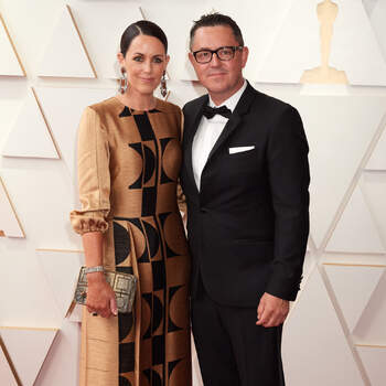 Oscar® nominee Greig Fraser (right) and Jodie Fried arrive on the red carpet of the 94th Oscars® at the Dolby Theatre at Ovation Hollywood in Los Angeles, CA, on Sunday, March 27, 2022.