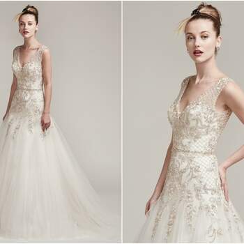 Il tulle aggiunge del lusso a questo spettacolare abito da sposa modello linea A, completato da cristalli Swarovski e perline. 