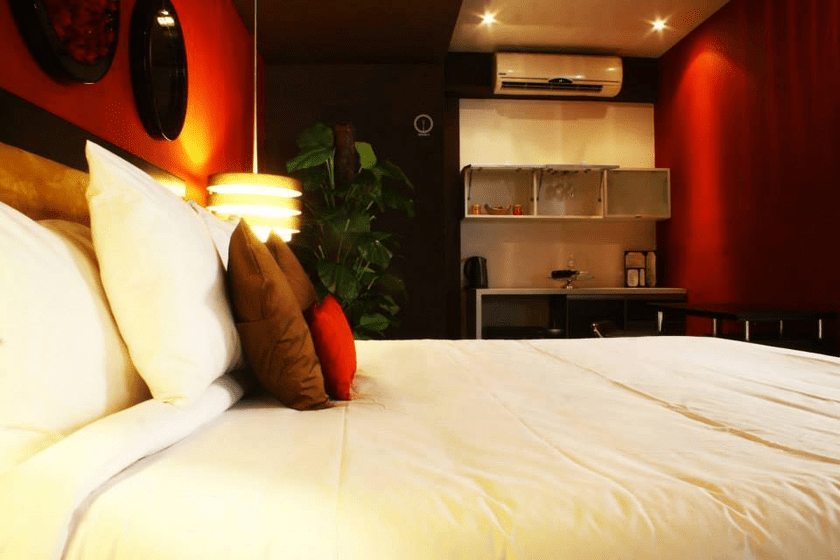 Ginebra Hotel & Suites